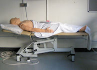 Resuscitation mannequin lying on a trolley
