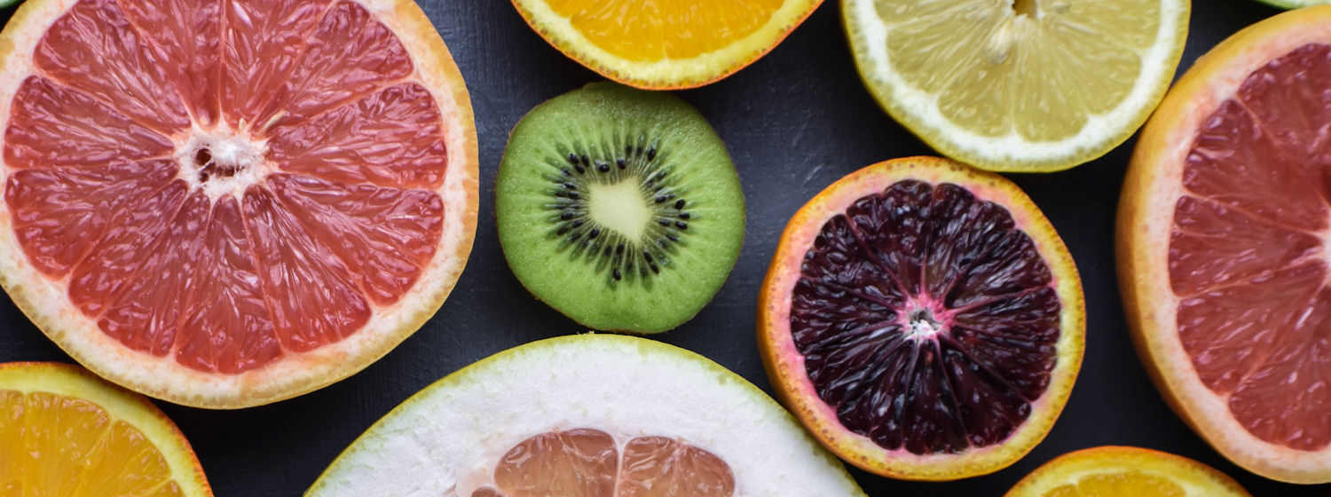 Slices of citrus fruits laid flat