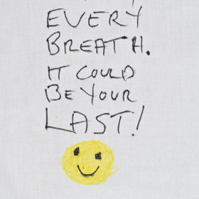 Handwritten 'Enjoy every breath it could be your last!' with 'smiley' face underneath.