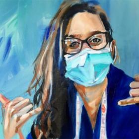 Portrait of clinician wearing mask.